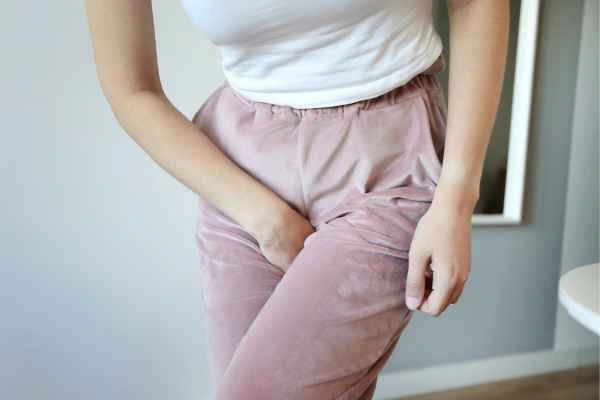 older woman running to the toilet because of urinary incontinence Chipping Norton